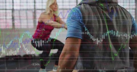 Personal trainer with digital market data overlay at gym