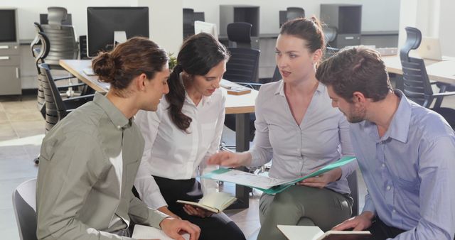 Business Colleagues Brainstorming with Documents in Modern Office - Download Free Stock Images Pikwizard.com