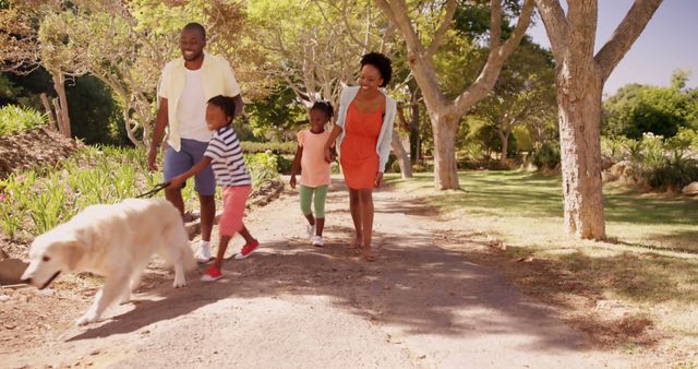 Family Walking with Dog in Park During Sunny Day - Download Free Stock Images Pikwizard.com