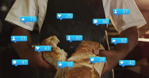Artisan baker showcasing rustic loaf with social media interaction