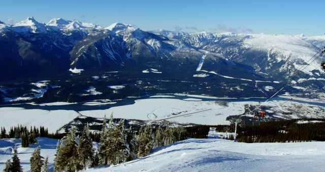 A panoramic view of a snowy mountain landscape with ski lifts and frosted trees, with copy space. Skiers and snowboarders often seek out such pristine conditions for winter sports and recreation.