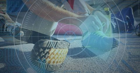 Athlete with prosthetic leg adjusting shoe before training