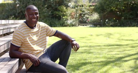 Relaxed Man Enjoying Nature on Sunny Day in Garden