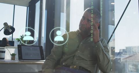 Contemplative Businessman, Digital Connections in Modern Office