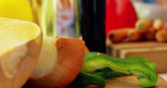 Fresh Vegetables Including Onion and Green Bell Pepper on Cutting Board - Download Free Stock Images Pikwizard.com