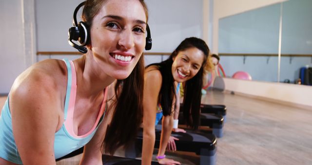 Happy Fitness Instructors Leading Exercise Class in Gym - Download Free Stock Images Pikwizard.com