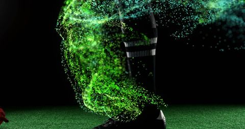 Dynamic Energy Particles Around Rugby Player Kicking Ball