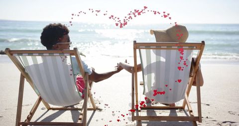 Romantic Couple Holding Hands on Beach Vacation