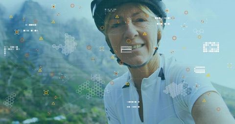 Cyclist Enjoying Mountain Adventure with Digital Technology Concept