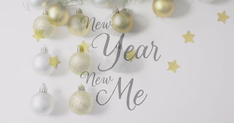 New year new me with christmas baubles and stars