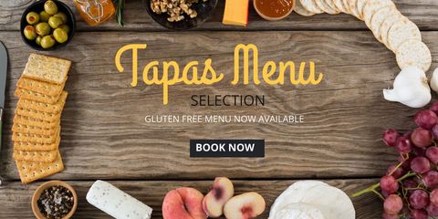 tapas menu with varied appetizers on rustic wooden table - Download Free Stock Templates Pikwizard.com