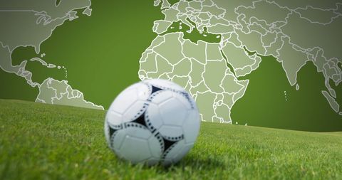 Soccer Ball on Grass with Dynamic World Map Background