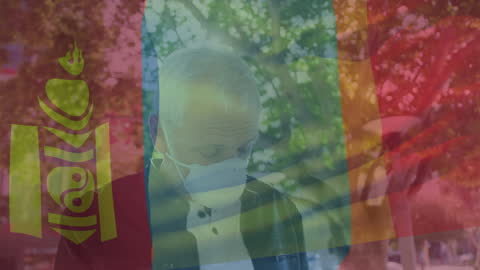 Man Wearing Face Mask in Glimmering Autumn Environment