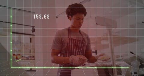 Café worker preparing sandwich with data overlay