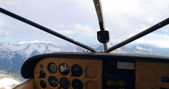 View from Cockpit of Small Aircraft Flying over Mountains - Download Free Stock Images Pikwizard.com