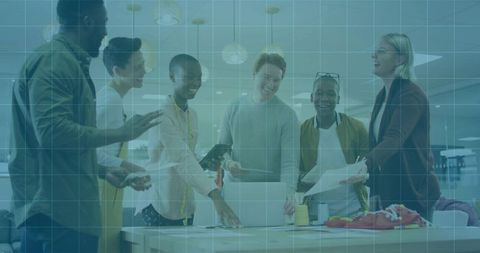 Diverse team collaborating in open office on creative project