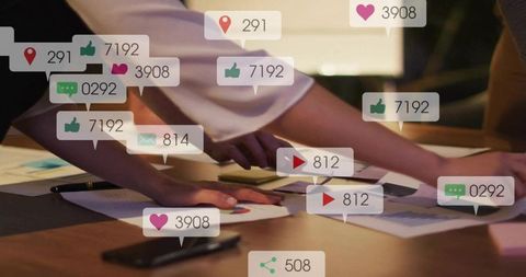 Colleagues Analyzing Data with Social Media Overlays