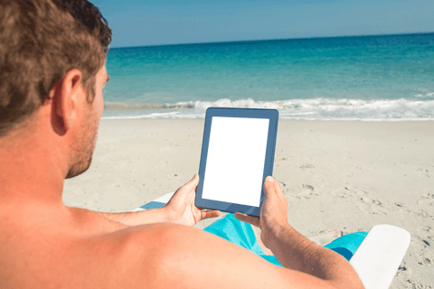 Summer Relaxation: Man Holding Transparent Screen Tablet on Beach - Download Free Stock Videos Pikwizard.com