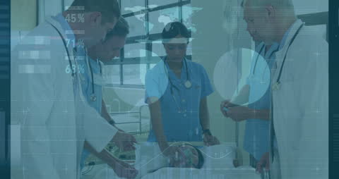 Doctors Analyzing Patient with Interactive Graphs and Data Displayed