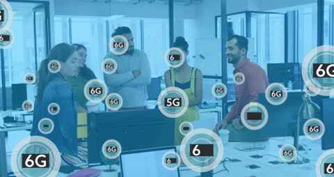 Diverse Team Collaborating on 6G Technology Project in Modern Office