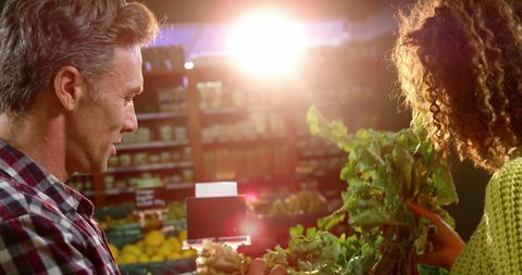 Couple Shopping for Fresh Vegetables in Organic Grocer