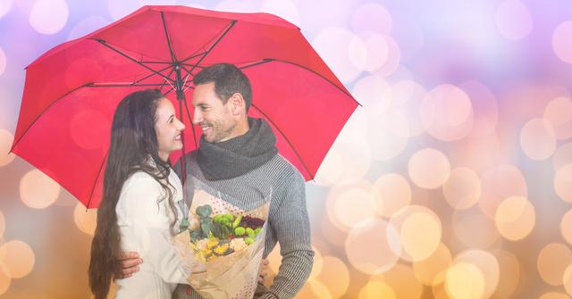 Digital composite of Loving couple with bouquet under umbrella