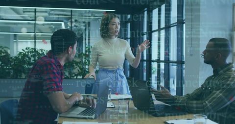 Team Collaboration in Modern Office with Technology Overlay