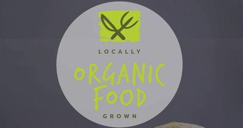 Locally grown organic food badge with lime fork-leaf logo on dark circular label