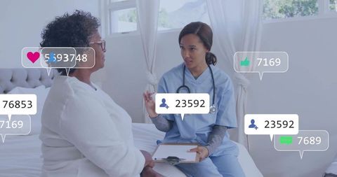 Homecare nurse consulting black patient with social media and telehealth engagement icons