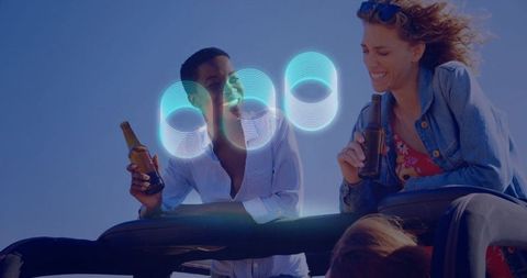 Friends Enjoying Summer Vibe with Refreshments in Convertible