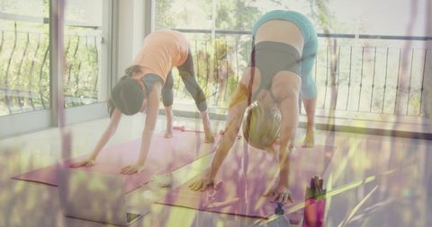 Mother and Daughter Doing Yoga at Home with Nature Overlay