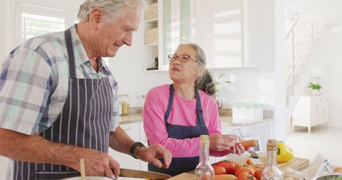 Senior Couple Cooking Together in Bright Home Kitchen - Download Free Stock Images Pikwizard.com