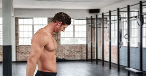 Athletic Man Performing Strength Training in Modern Gym - Download Free Stock Images Pikwizard.com