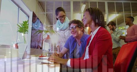 Team Collaborating on Financial Analysis in Open Plan Office