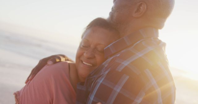 Joyful Senior African American Couple Embracing on Beach - Download Free Stock Images Pikwizard.com