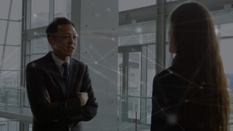 Diverse Business Professionals Engaged in Digital Network Discussion