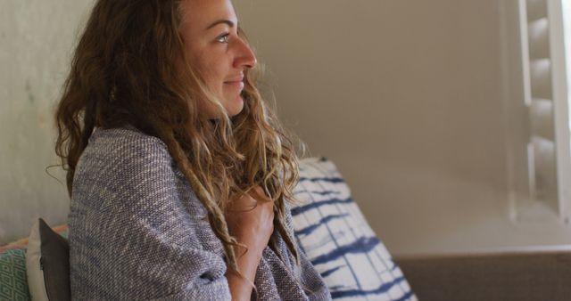 Young Woman Relaxing with Blanket in Cozy Home Environment - Download Free Stock Images Pikwizard.com