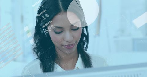 Businesswoman analyzing data with headset and digital interface