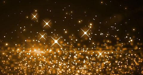Glowing Gold Lights on Brown Background - Download Free Stock Images Pikwizard.com