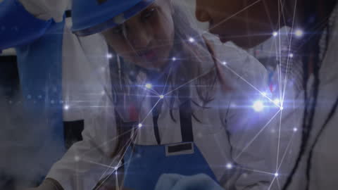 Diverse Female Scientists Innovating in Lab with Digital Overlay