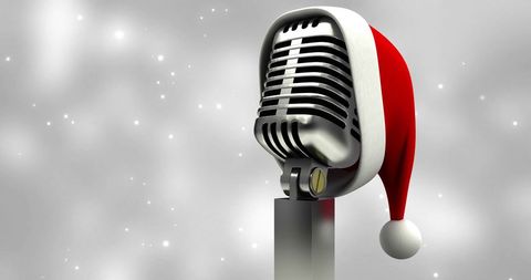 Vintage microphone with santa hat celebrating christmas
