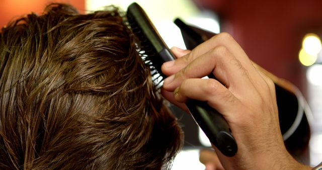 Hairdresser Styling Hair with Blow Dryer and Brush - Download Free Stock Images Pikwizard.com