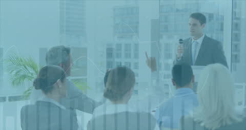 Business Seminar with Financial Data Overlay in Modern Office