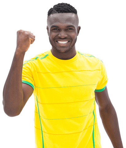 Smiling Athlete in Yellow Jersey Clenching Fist on Transparent Background