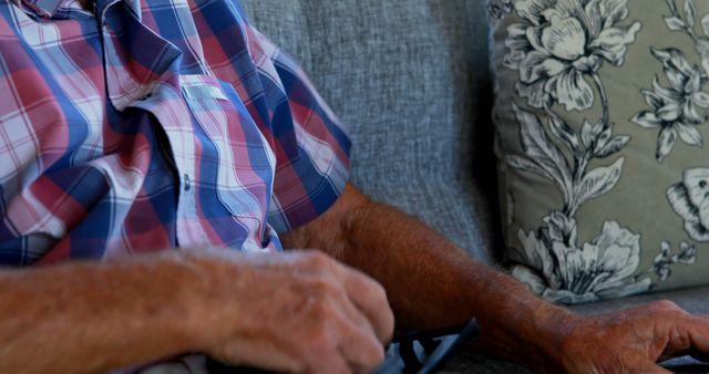 Senior Man Relaxing on Couch with Designer Pillow - Download Free Stock Images Pikwizard.com