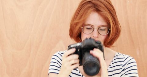 Redhead Woman Photographing Lifestyle Indoors