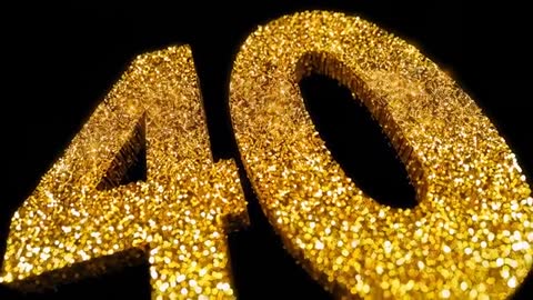 Camera Dollying Toward Glittering Gold Number 40 Revealing Sparkling 3D Texture