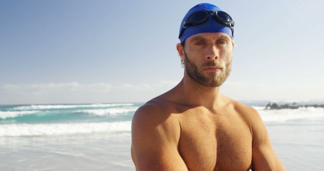 Athletic Male Swimmer Standing Confidently at Beach - Download Free Stock Images Pikwizard.com