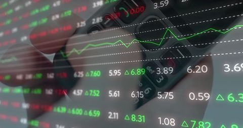 Financial data overlay with smartphone in hand