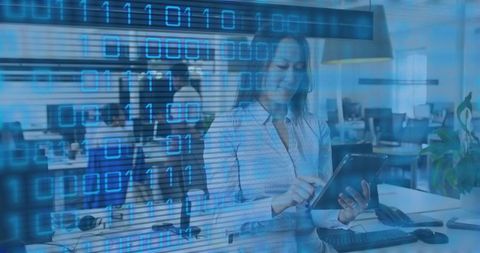 Korean businesswoman using tablet in modern open office with digital binary data overlay